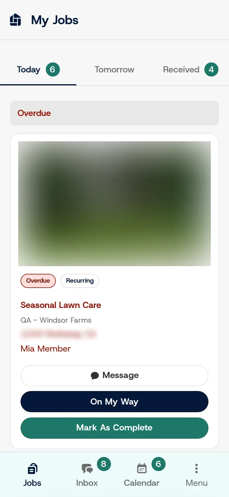 The field-staff My Jobs screen on a phone, showing an overdue Seasonal Lawn Care job with Message, On My Way and Mark As Complete buttons.